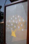 Aamr Shvet Hand-Woven Fabric Wall Art in Wood Frame